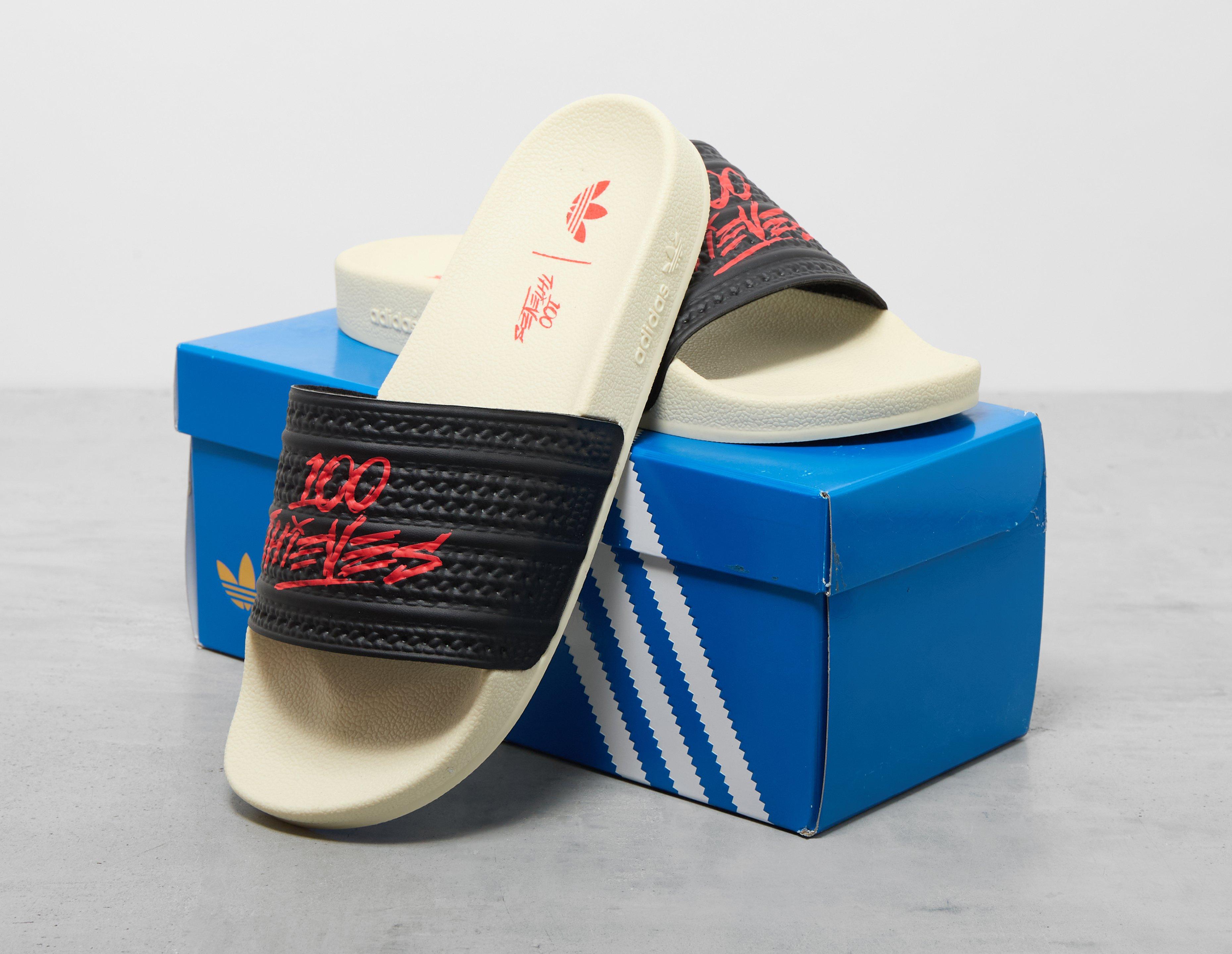 ◆コラボ商品◆100 THIEVES X ADIDAS ADILETTE SLIDE◆正規品◆ Buy 100 Thieves x Adilette Slide 'Black Red' - JR9152 | GOAT