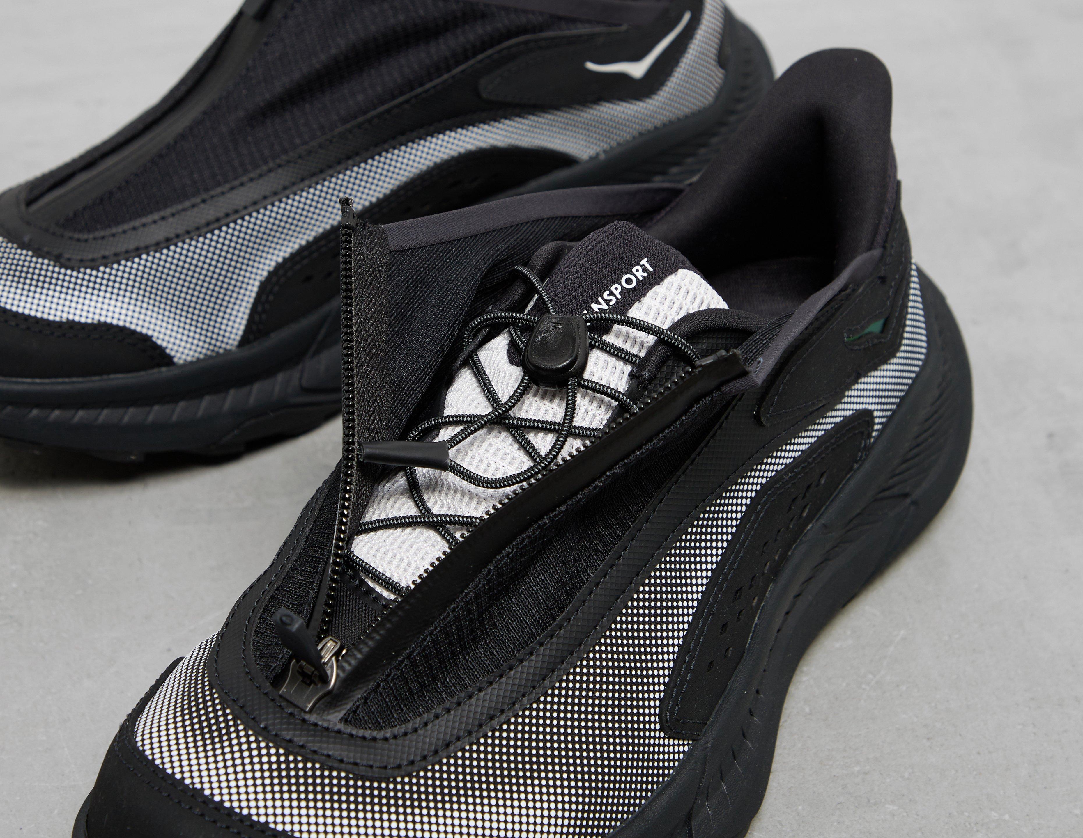 Black HOKA Project Transport