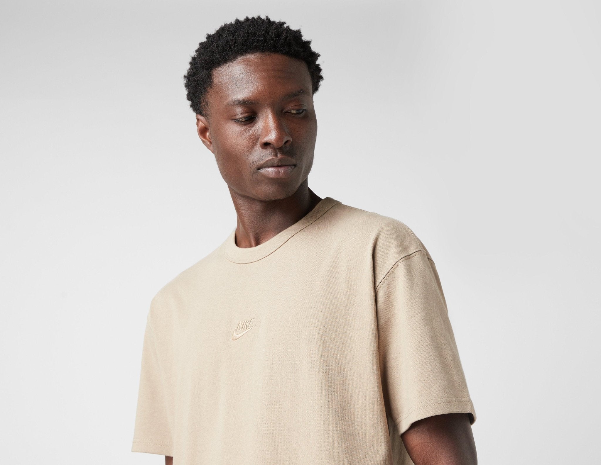 beige nike shirt
